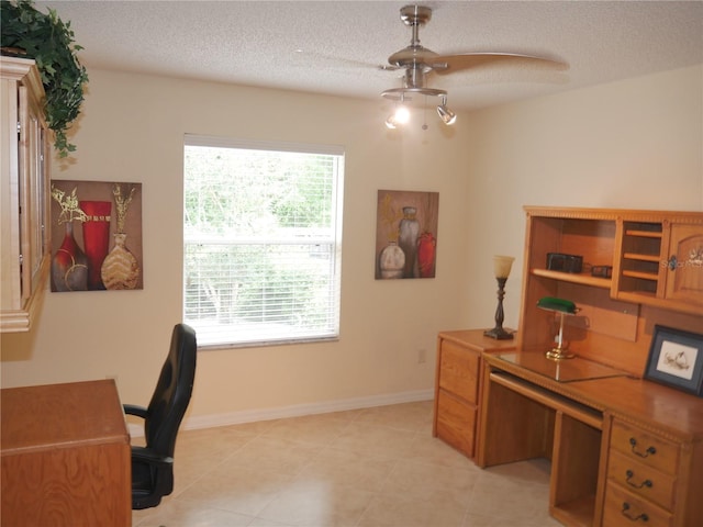 8377 SE 177th Bartram Loop, The Villages, FL 32162 - office space featuring a textured ceiling, baseboards, and light tile patterned flooring