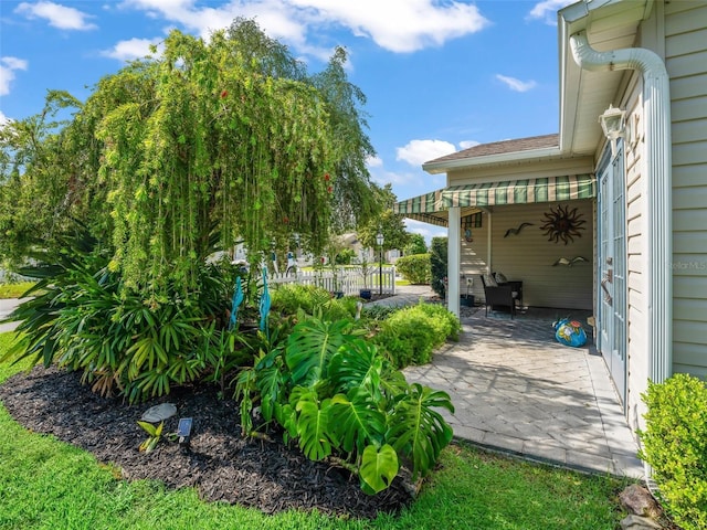 17324 SE 82nd Pecan Ter, The Villages, FL 32162 - view of yard featuring a patio area