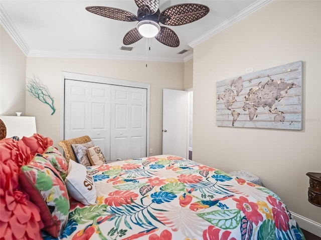 17324 SE 82nd Pecan Ter, The Villages, FL 32162 - bedroom with ornamental molding, a closet, and a ceiling fan