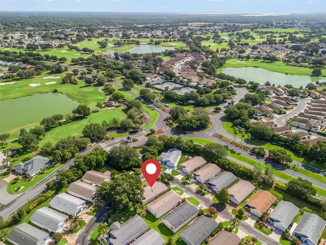 17324 SE 82nd Pecan Ter, The Villages, FL 32162 - aerial view of property and surrounding area with a nearby body of water, nearby suburban area, and a golf club