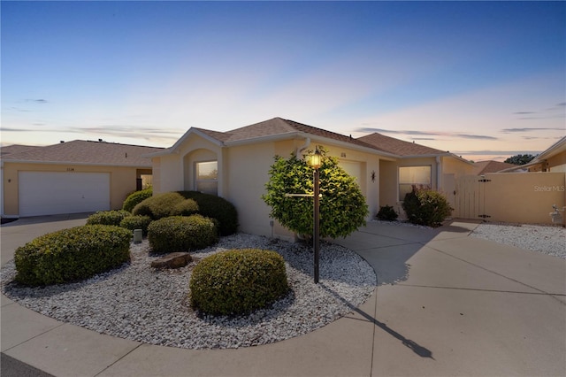 1116 San Bernardo Rd, The Villages, FL 32162 - ranch-style home featuring a garage, driveway, and stucco siding