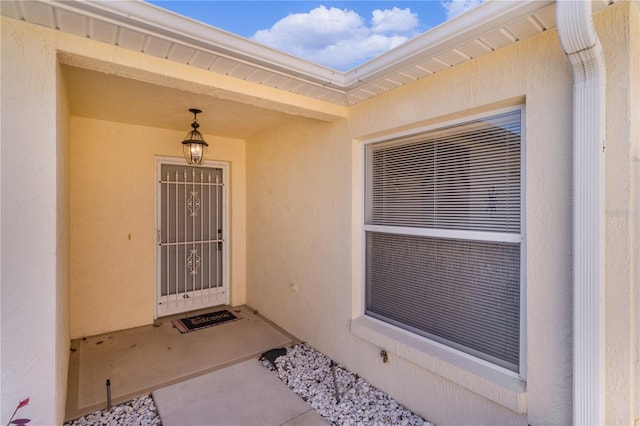 1116 San Bernardo Rd, The Villages, FL 32162 - view of exterior entry with stucco siding