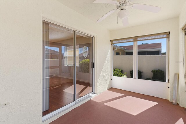 1116 San Bernardo Rd, The Villages, FL 32162 - unfurnished sunroom with a ceiling fan