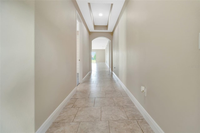 15531 Waterleigh Cove Dr, Winter Garden, FL 34787 - hallway featuring arched walkways and baseboards