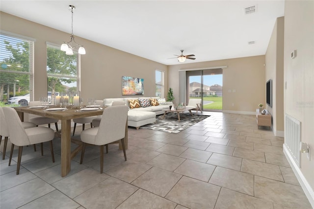 15531 Waterleigh Cove Dr, Winter Garden, FL 34787 - dining room with ceiling fan and light tile patterned floors