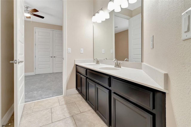 15531 Waterleigh Cove Dr, Winter Garden, FL 34787 - bathroom featuring double vanity, a ceiling fan, and tile patterned flooring
