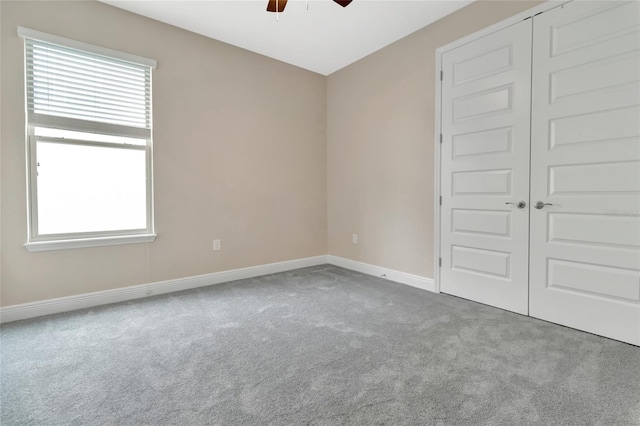 15531 Waterleigh Cove Dr, Winter Garden, FL 34787 - unfurnished bedroom with carpet floors, a closet, and a ceiling fan