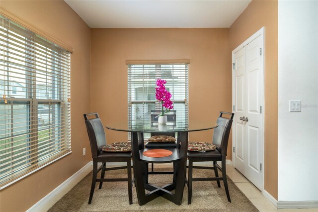 212 Primrose Dr, Davenport, FL 33837 - dining area featuring baseboards