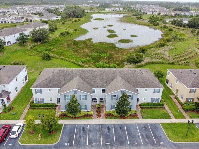 212 Primrose Dr, Davenport, FL 33837 - aerial view of property and surrounding area featuring a nearby body of water