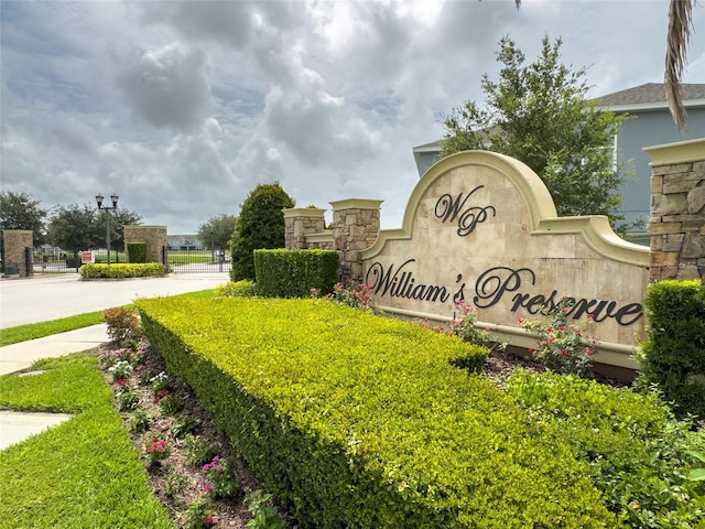 212 Primrose Dr, Davenport, FL 33837 - community / neighborhood sign featuring a gate