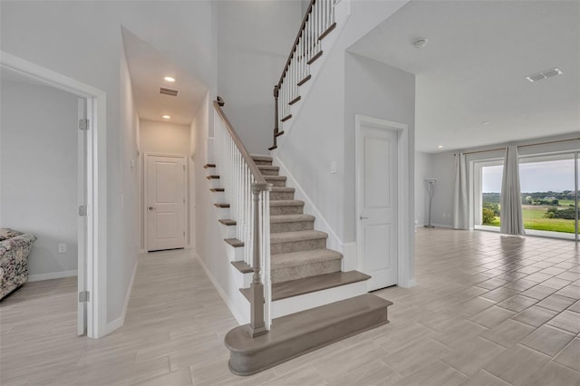2147 Timber Creek Ln, Clermont, FL 34715 - stairs with baseboards, recessed lighting, and wood finished floors