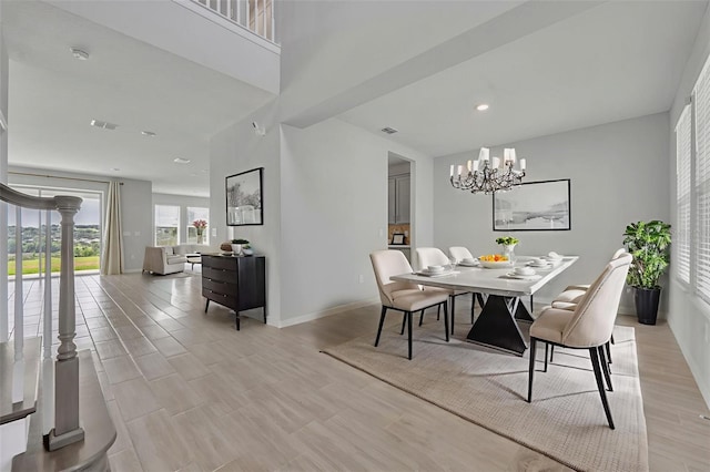 2147 Timber Creek Ln, Clermont, FL 34715 - dining space with a chandelier, baseboards, recessed lighting, and light wood-type flooring