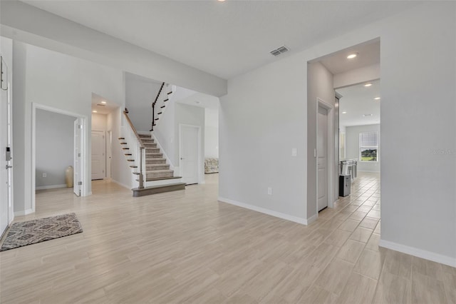 2147 Timber Creek Ln, Clermont, FL 34715 - entryway with stairs, recessed lighting, baseboards, and light wood-style floors