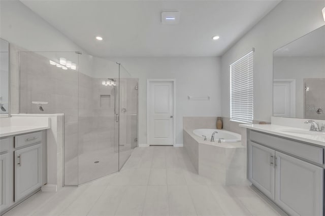 2147 Timber Creek Ln, Clermont, FL 34715 - full bath featuring vanity, a bath, a stall shower, tile patterned flooring, and recessed lighting