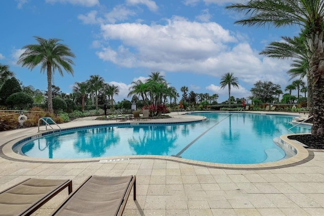 2147 Timber Creek Ln, Clermont, FL 34715 - community pool featuring a patio
