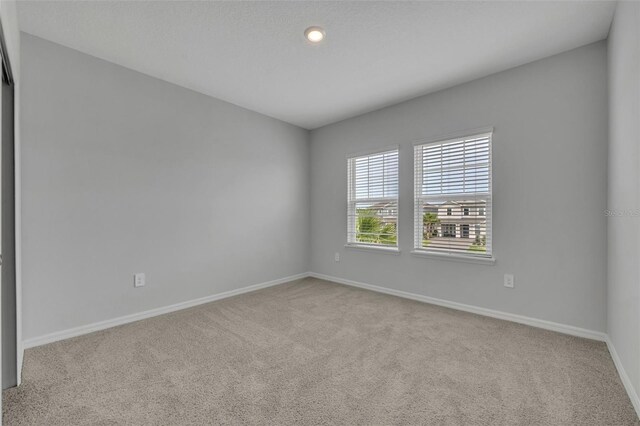 2147 Timber Creek Ln, Clermont, FL 34715 - unfurnished room featuring carpet flooring, baseboards, and recessed lighting