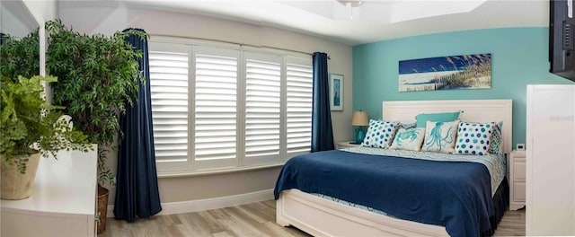 3466 Smedley Rd, The Villages, FL 32163 - bedroom featuring wood finished floors and baseboards