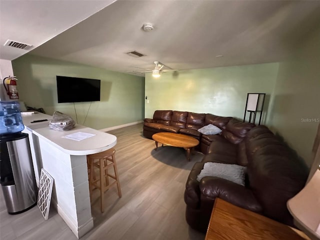 5454-5456 8th Ave, Fort Myers, FL 33907 - living room with baseboards, wood finished floors, and a ceiling fan