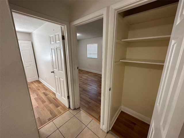5454-5456 8th Ave, Fort Myers, FL 33907 - hallway with light wood-style flooring and baseboards