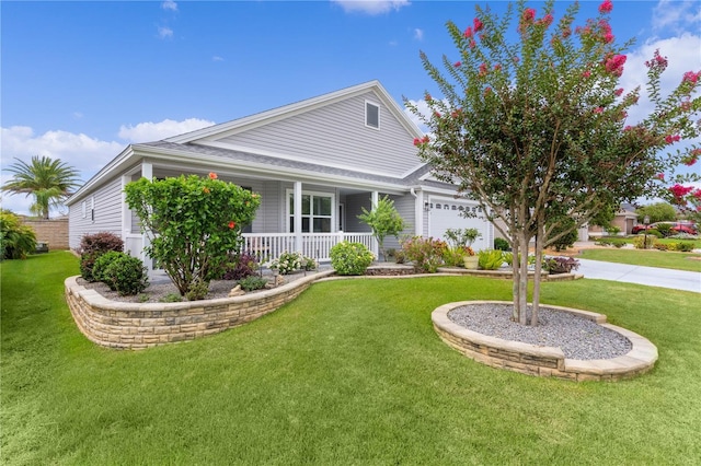 3978 Nottingham Loop, The Villages, FL 32163 - view of front of home featuring a porch, a garage, and a front lawn