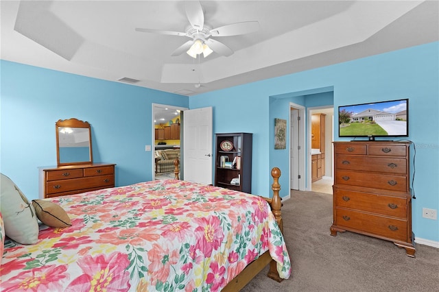 3978 Nottingham Loop, The Villages, FL 32163 - bedroom with carpet, a raised ceiling, baseboards, and a ceiling fan