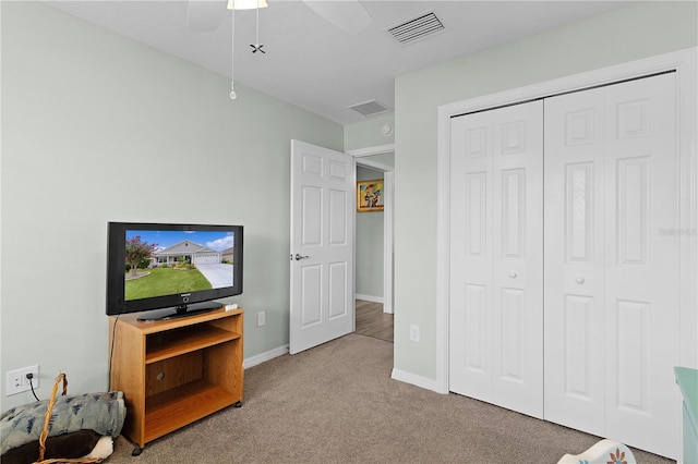 3978 Nottingham Loop, The Villages, FL 32163 - living room with carpet, ceiling fan, and baseboards