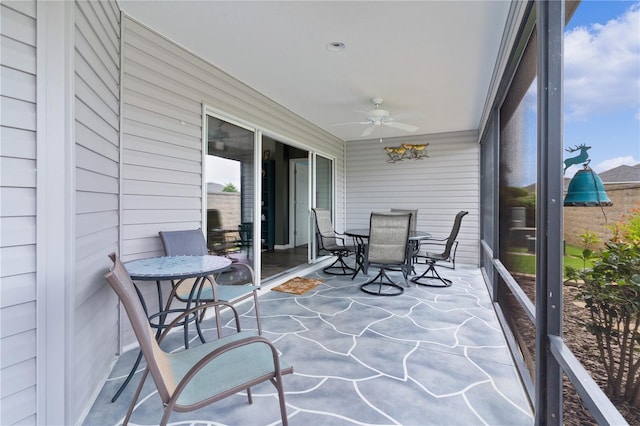 3978 Nottingham Loop, The Villages, FL 32163 - sunroom with a ceiling fan and outdoor dining area