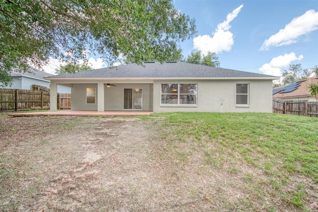 832 Willow Run St, Minneola, FL 34715 - rear view of property with ceiling fan, stucco siding, a fenced backyard, and a patio