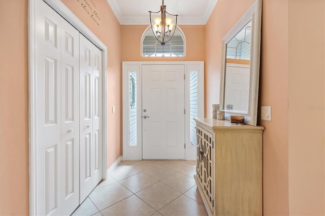 2991 Saint Thomas Ln, The Villages, FL 32162 - entryway featuring a chandelier, crown molding, light tile patterned floors, and baseboards