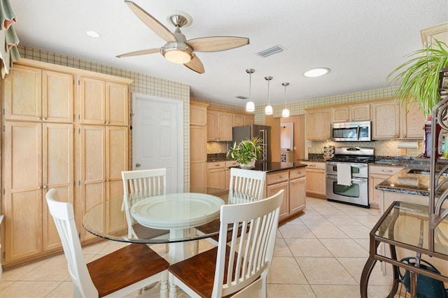 2991 Saint Thomas Ln, The Villages, FL 32162 - dining space with light tile patterned floors, a ceiling fan, and recessed lighting