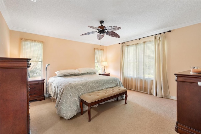 2991 Saint Thomas Ln, The Villages, FL 32162 - bedroom with light colored carpet, a textured ceiling, crown molding, and ceiling fan