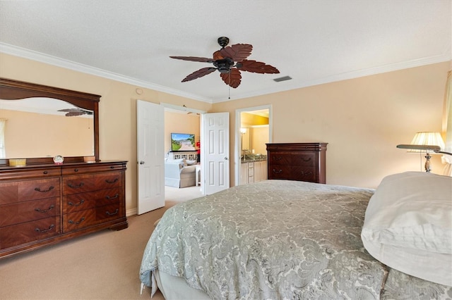 2991 Saint Thomas Ln, The Villages, FL 32162 - bedroom with light carpet, ornamental molding, ceiling fan, and ensuite bathroom