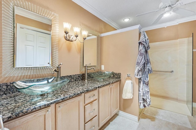 2991 Saint Thomas Ln, The Villages, FL 32162 - bathroom with double vanity, ornamental molding, tile patterned flooring, a walk in shower, and ceiling fan