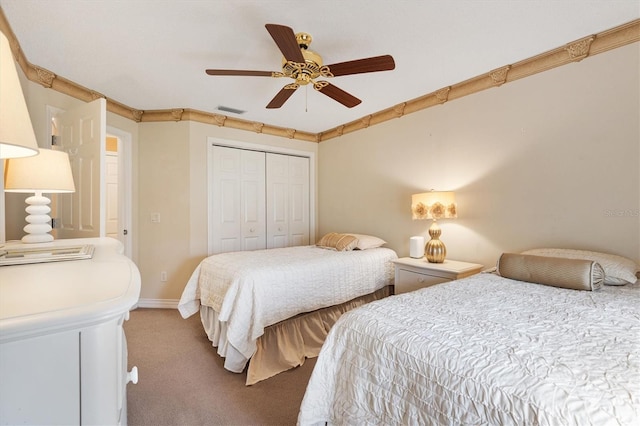 2991 Saint Thomas Ln, The Villages, FL 32162 - carpeted bedroom with a closet and ceiling fan