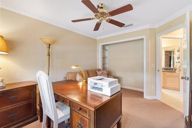 2991 Saint Thomas Ln, The Villages, FL 32162 - office area featuring a ceiling fan, light colored carpet, ornamental molding, and baseboards