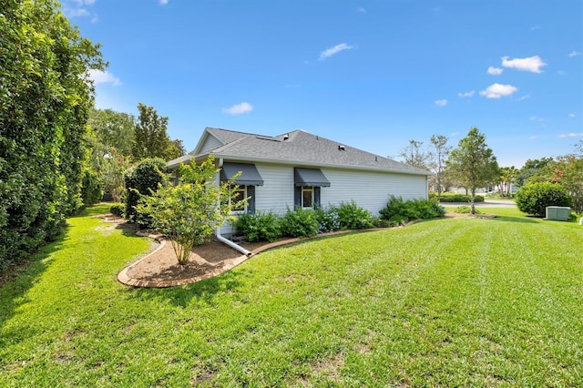 2991 Saint Thomas Ln, The Villages, FL 32162 - view of property exterior featuring a lawn