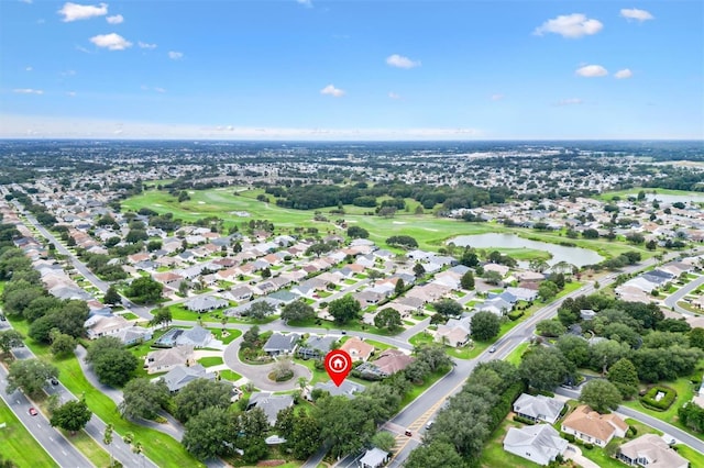 2991 Saint Thomas Ln, The Villages, FL 32162 - aerial view of property and surrounding area featuring a large body of water, a golf course, and nearby suburban area