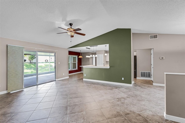 15916 Indian Wells Ct, Clermont, FL 34711 - unfurnished living room with vaulted ceiling, ceiling fan, a textured ceiling, baseboards, and light tile patterned flooring