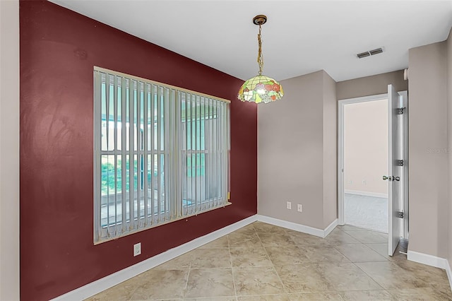 15916 Indian Wells Ct, Clermont, FL 34711 - spare room with baseboards and tile patterned floors