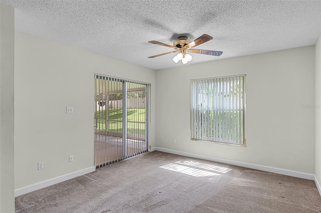 15916 Indian Wells Ct, Clermont, FL 34711 - spare room featuring ceiling fan, carpet floors, a textured ceiling, and baseboards