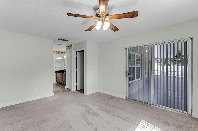 15916 Indian Wells Ct, Clermont, FL 34711 - empty room featuring carpet, baseboards, and a ceiling fan