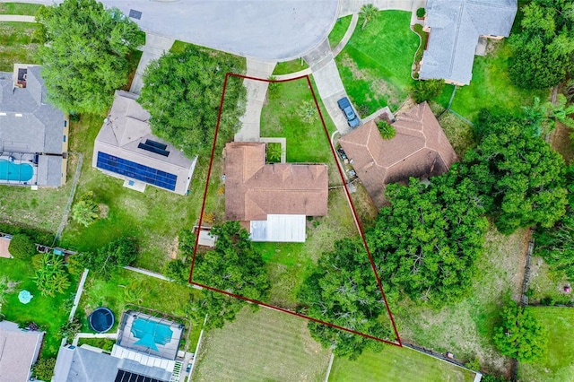 15916 Indian Wells Ct, Clermont, FL 34711 - aerial view of property and surrounding area with a pool area and property parcel outlined