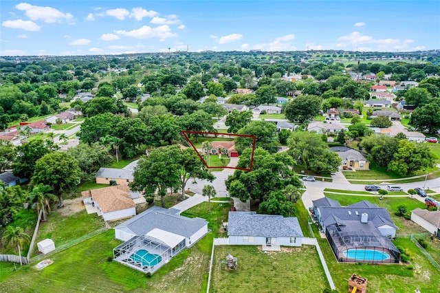 15916 Indian Wells Ct, Clermont, FL 34711 - aerial perspective of suburban area featuring property parcel outlined