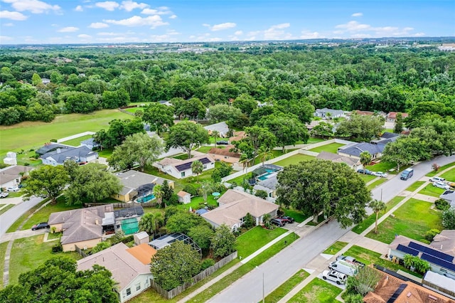 15916 Indian Wells Ct, Clermont, FL 34711 - aerial view of residential area featuring a forest