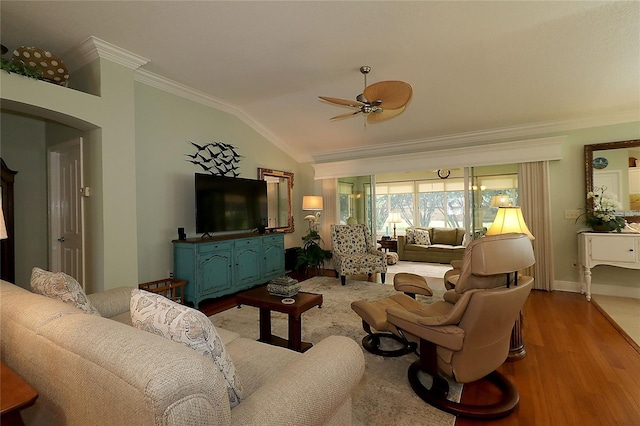 1553 Lynchburg Loop, The Villages, FL 32162 - living area featuring ornamental molding, ceiling fan, vaulted ceiling, wood finished floors, and baseboards