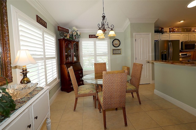 1553 Lynchburg Loop, The Villages, FL 32162 - dining room with plenty of natural light, a chandelier, ornamental molding, light tile patterned floors, and vaulted ceiling