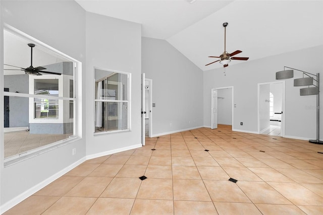 2705 Bayview Dr, Eustis, FL 32726 - tiled empty room featuring ceiling fan and high vaulted ceiling