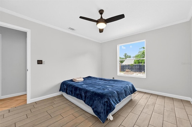2705 Bayview Dr, Eustis, FL 32726 - bedroom with wood finish floors, crown molding, baseboards, and a ceiling fan