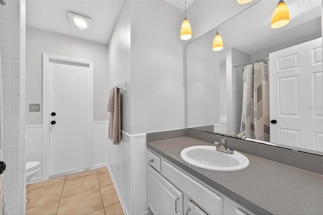 2705 Bayview Dr, Eustis, FL 32726 - bathroom featuring toilet, vanity, and tile patterned flooring