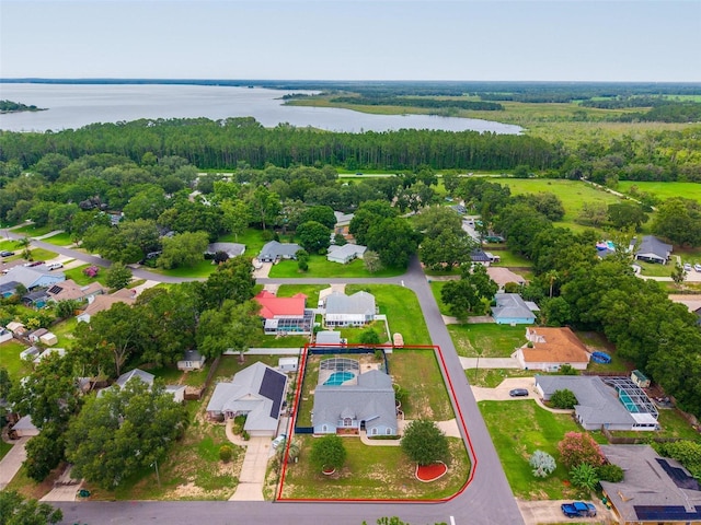2705 Bayview Dr, Eustis, FL 32726 - aerial view of residential area featuring a nearby body of water, property boundaries highlighted, and a forest
